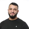 Porträtt av Hassan Alameeri
